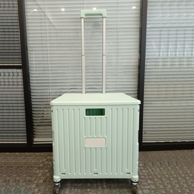 スーパーマーケットの座席ハンドルの車輪が付いているプラスチック買物車の折り畳み式のトロリー