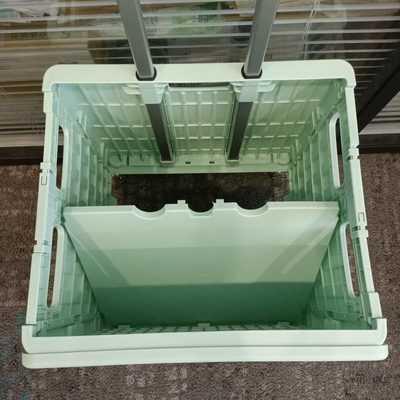 スーパーマーケットの座席ハンドルの車輪が付いているプラスチック買物車の折り畳み式のトロリー